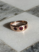 Load image into Gallery viewer, Garnet Starburst 10k Gold Trilogy Ring