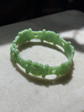 Load image into Gallery viewer, Vintage 1940s Carved Celluloid Floral Green Bangle Bracelet
