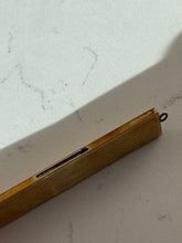 Load image into Gallery viewer, Antique 1922 Goldtone Retractable Comb
