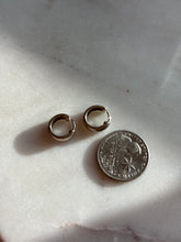 Load image into Gallery viewer, Mini Sterling Silver Clicker Huggie Hoops
