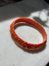 Load image into Gallery viewer, Vintage 1940s Carved Celluloid Orange Floral Bangle Bracelet
