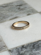 Load image into Gallery viewer, Vintage 14k Gold Diamond Quarter Eternity Band Size 5
