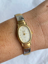 Load image into Gallery viewer, Oval Two-Toned Timex Vintage Expansion Watch
