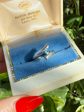 Load image into Gallery viewer, Blue Topaz Sterling Silver Ring Size 7.25
