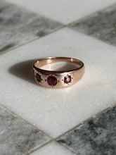 Load image into Gallery viewer, Garnet Starburst 10k Gold Trilogy Ring
