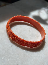 Load image into Gallery viewer, Vintage 1940s Carved Celluloid Orange Floral Bangle Bracelet
