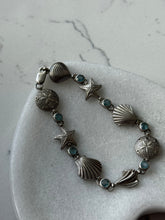 Load image into Gallery viewer, Blue Topaz Seashell Sterling Bracelet 7.25”
