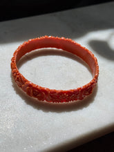 Load image into Gallery viewer, Vintage 1940s Carved Celluloid Orange Floral Bangle Bracelet
