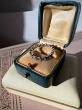 Load image into Gallery viewer, Floral Sterling Silver Band Size 7.25
