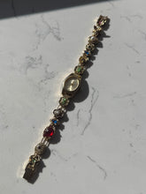 Load image into Gallery viewer, Vintage Goldtone Slider Charm Wrist Watch
