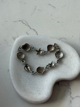 Load image into Gallery viewer, Blue Topaz Seashell Sterling Bracelet 7.25”

