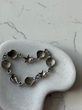 Load image into Gallery viewer, Blue Topaz Seashell Sterling Bracelet 7.25”
