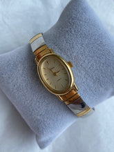 Load image into Gallery viewer, Oval Two-Toned Timex Vintage Expansion Watch
