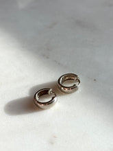 Load image into Gallery viewer, Mini Sterling Silver Clicker Huggie Hoops
