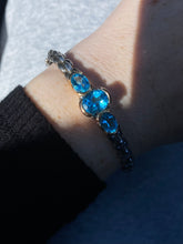 Load image into Gallery viewer, Blue Topaz Sterling Silver Bangle Bracelet
