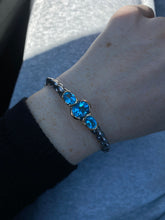 Load image into Gallery viewer, Blue Topaz Sterling Silver Bangle Bracelet
