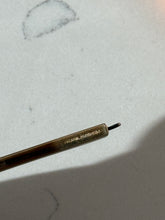Load image into Gallery viewer, Antique 1922 Goldtone Retractable Comb
